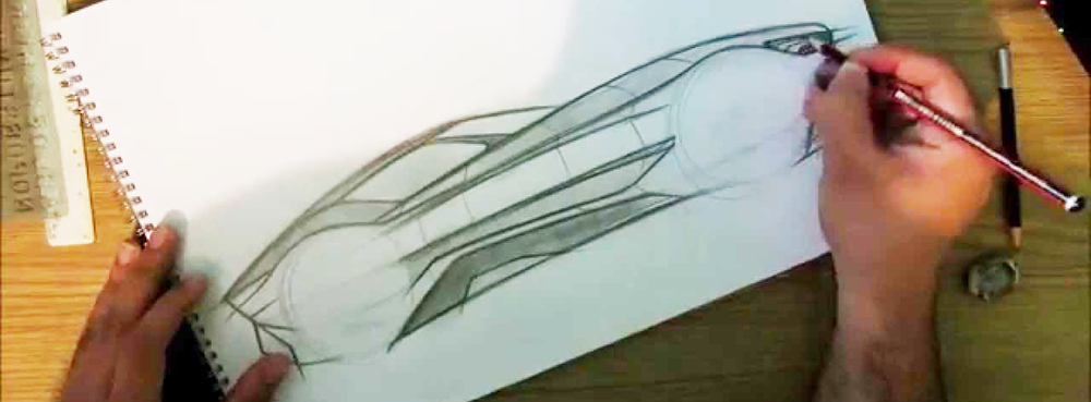 student doing a car design drawing
